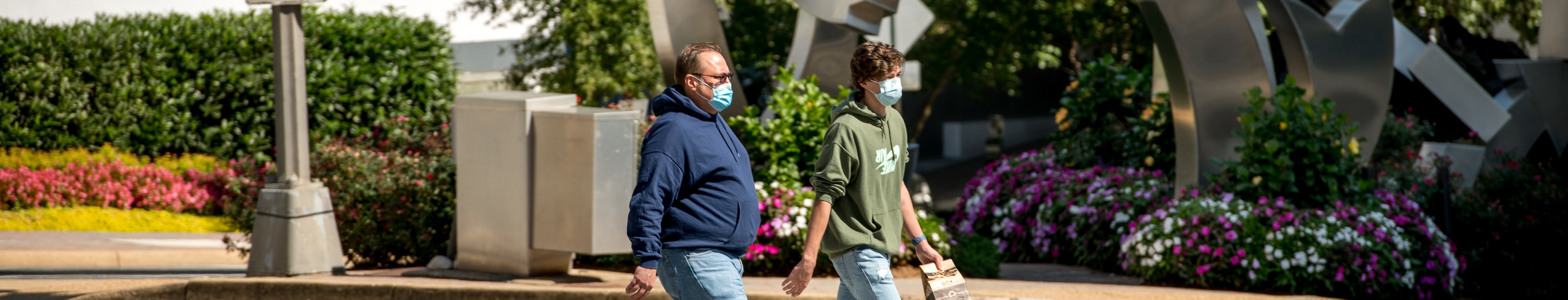 two-people-walking-in-rosslyn